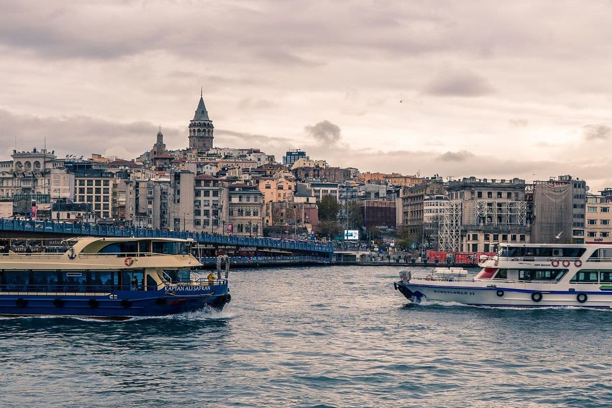 Ferries with the Galata Tower behind